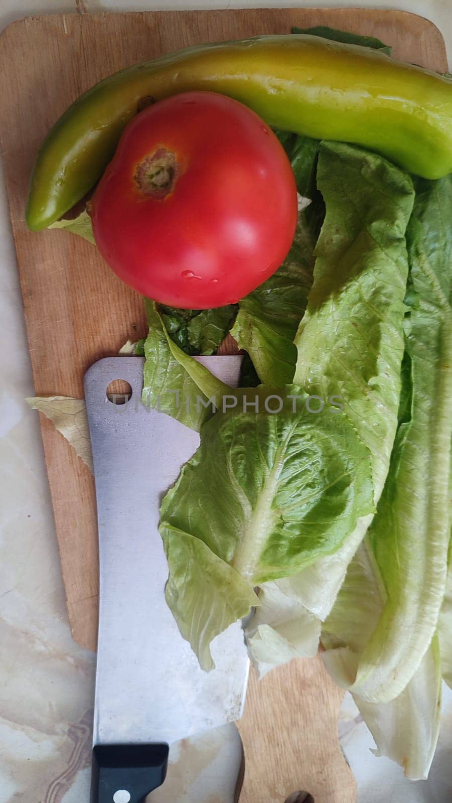 green khasa salad, hot pepper and tomato, vegetables food. High quality photo