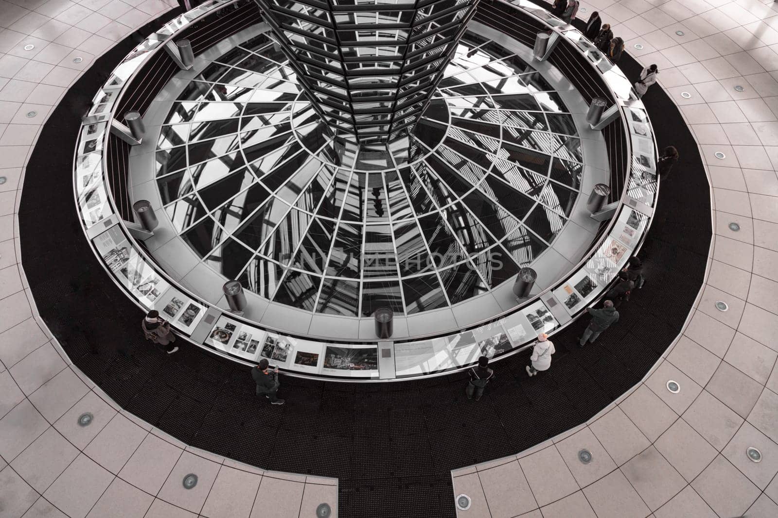 Berlin, Germany - Dec 20, 2023 - Architecture interior of the Cupola of the Reichstag dome is a glass dome constructed on top of the rebuilt Reichstag building. a major tourist attraction of the berlin city, Space for text, Selective focus.