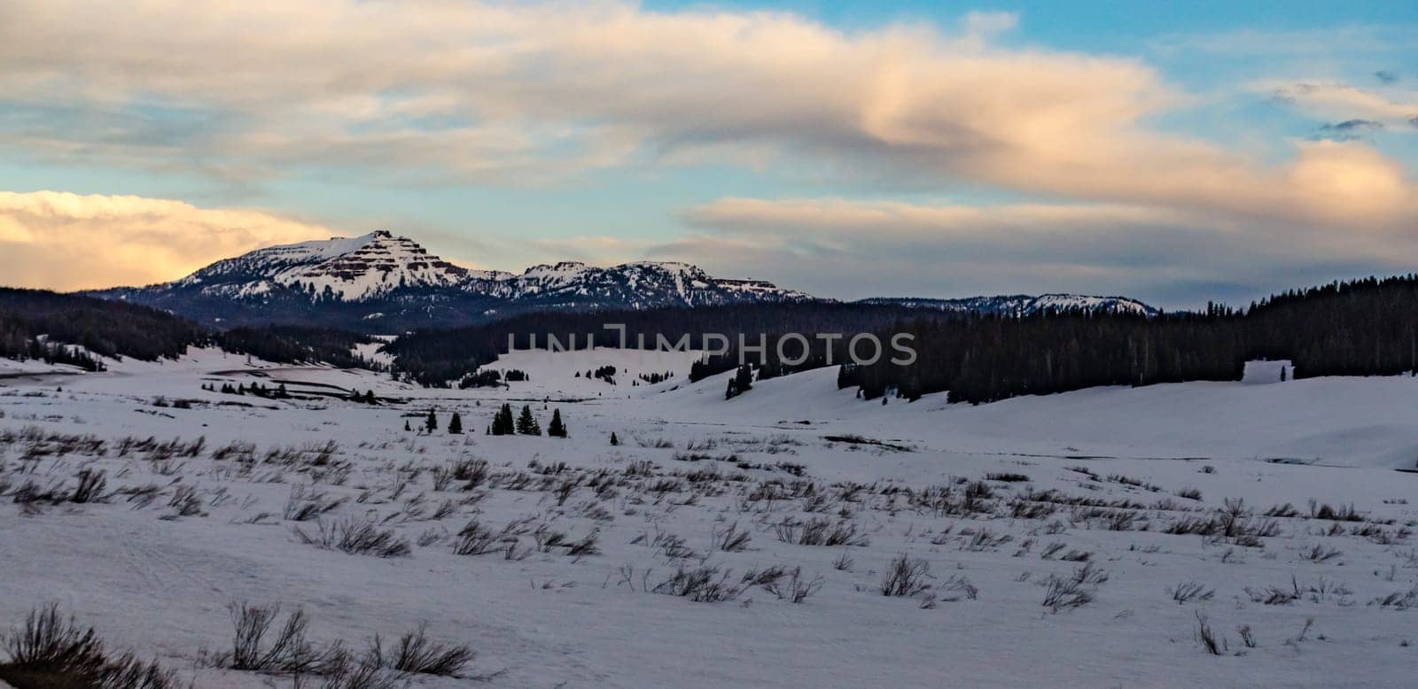 Mountains covered with snow in the evening at sunset, USA