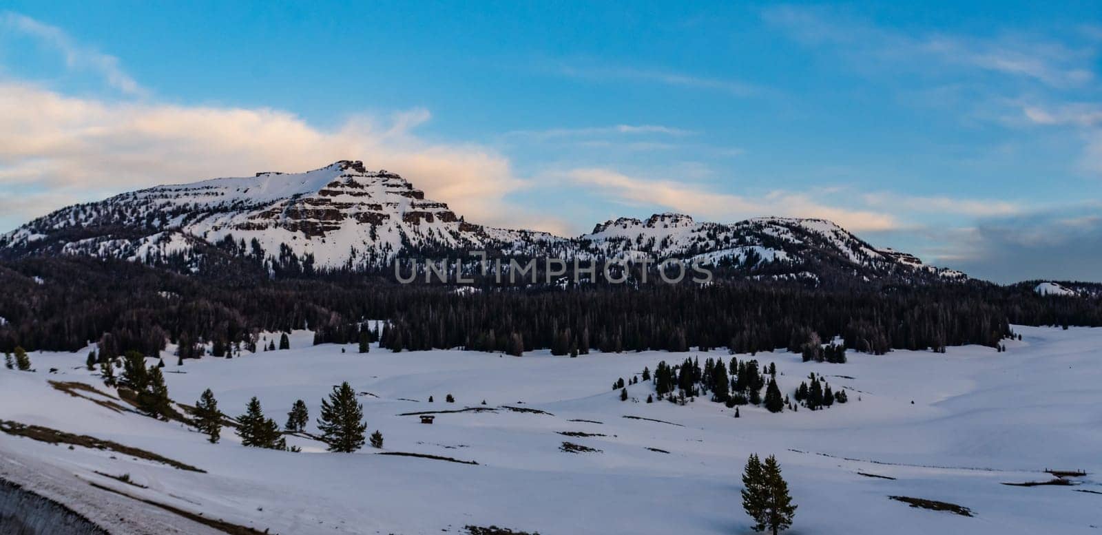 Mountains covered with snow in the evening at sunset, USA
