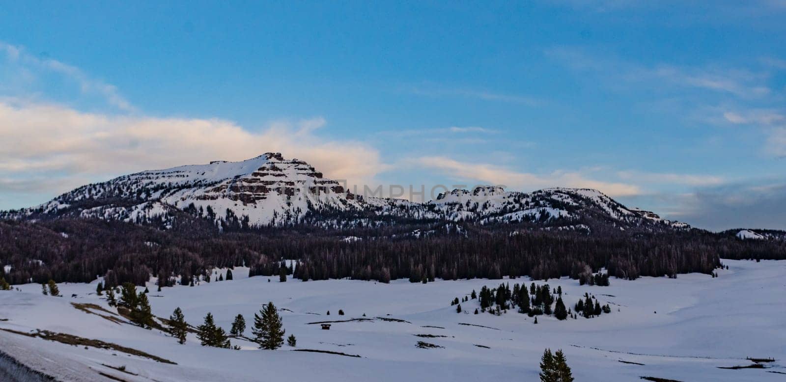 Mountains covered with snow in the evening at sunset, USA