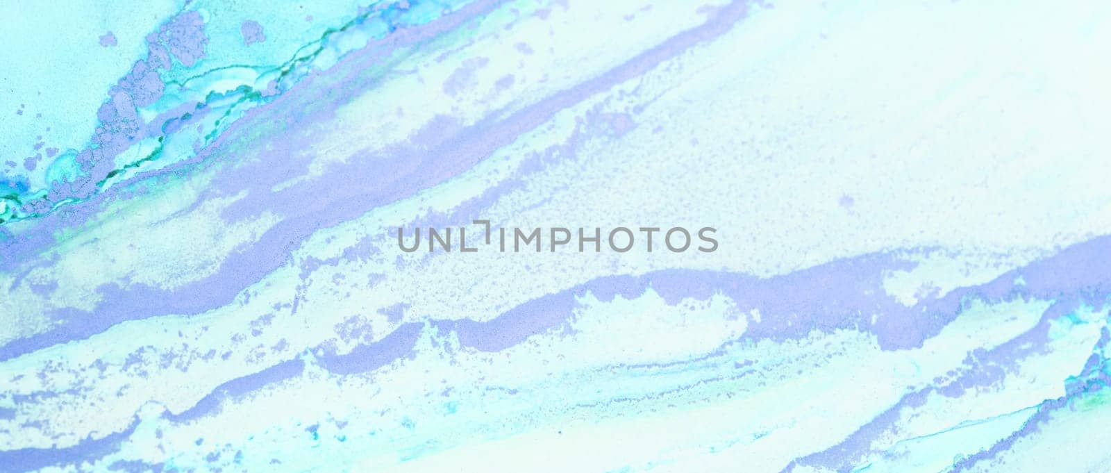An abstract composition features flowing strokes of blue and lavender watercolor, evoking tranquility and softness in its appearance, perfect for contemporary decor.