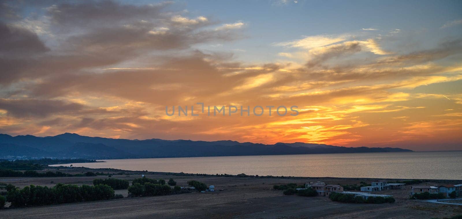 sunset on the mediterranean sea island cyprus beautiful view of the sea and mountains