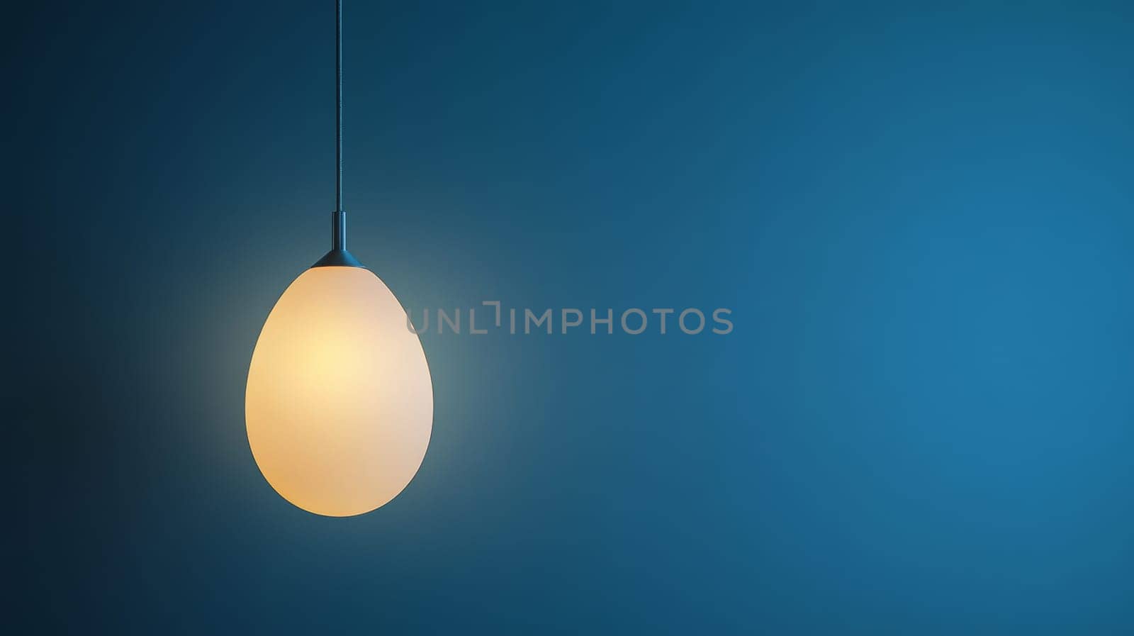 Pendant lamp against blue background, modern interior lighting concept.