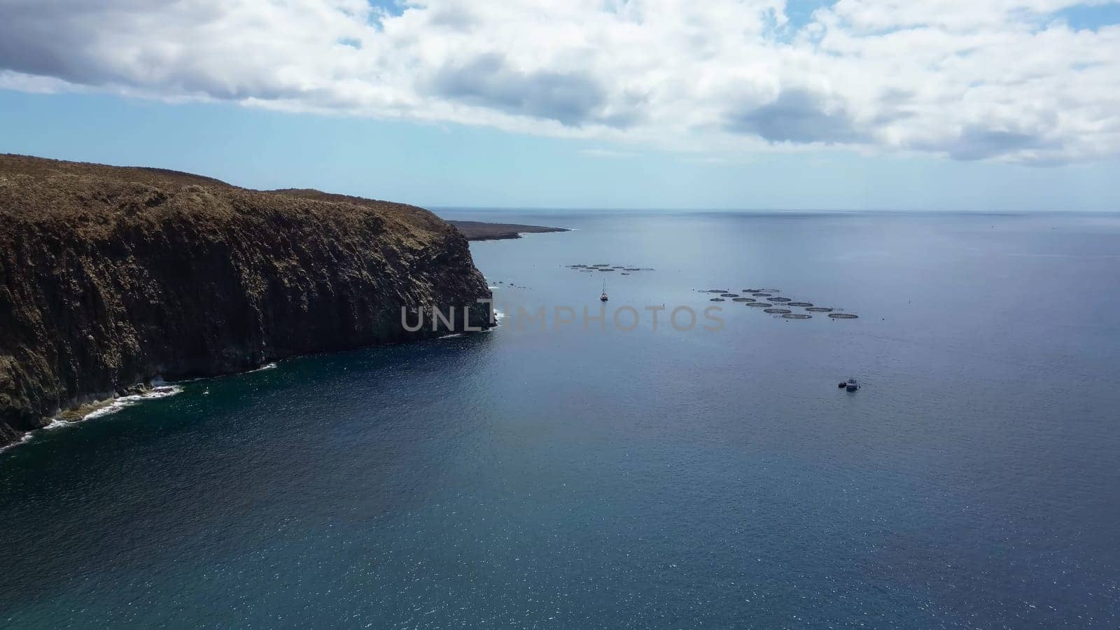 Large rock formations that look like Los Gigantes right on the atlantic ocean on the Canary Island of Tenerife. by MP_foto71