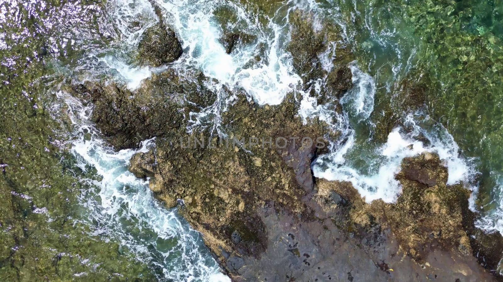 Big ocean waves meet the rocky coasts of the Canary Island of Tenerife