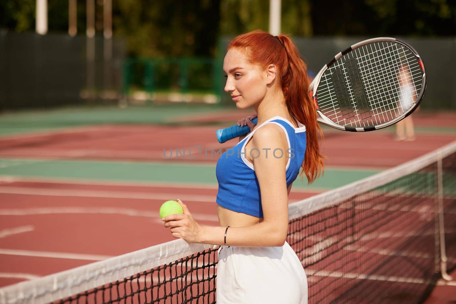 young woman playing tennis on the tennis court, olympic sport, outdoor activity concept