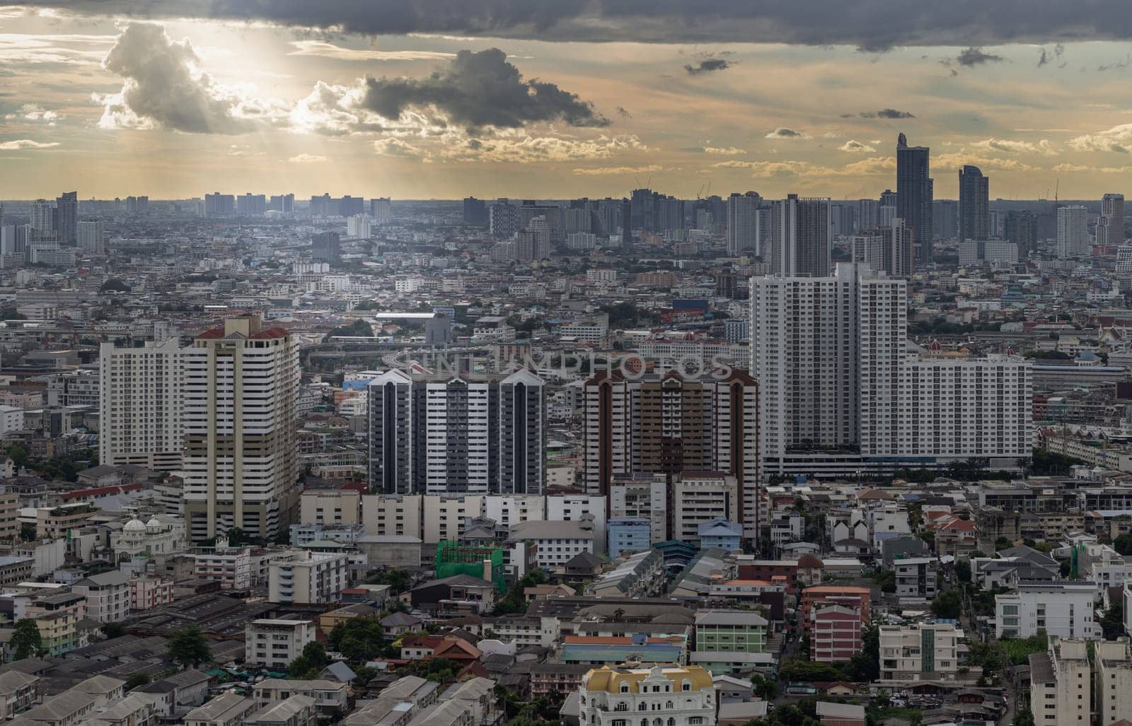 Bangkok, Thailand - 04 Sep, 2024 - Amazing Clouds and Sky over Metropolitan City before sunset. Bangkok city skyscrapers with Dramatic sky background. use it as your wallpaper, poster and banner design, Space for text, Selective focus.