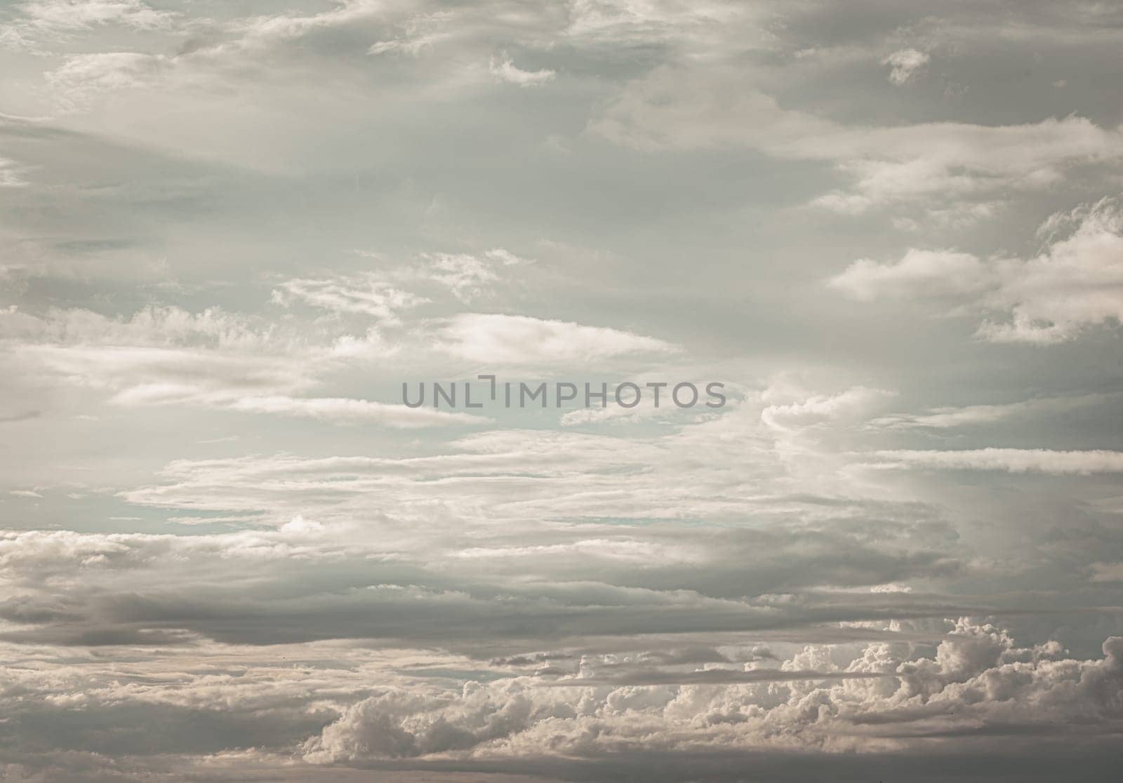 Beautiful sky with clouds background. The softness of the clouds and the brightness of the sky. Light blue background. Relaxing feeling and inspirational, Nature abstract composition, Space for text, Selective focus.
