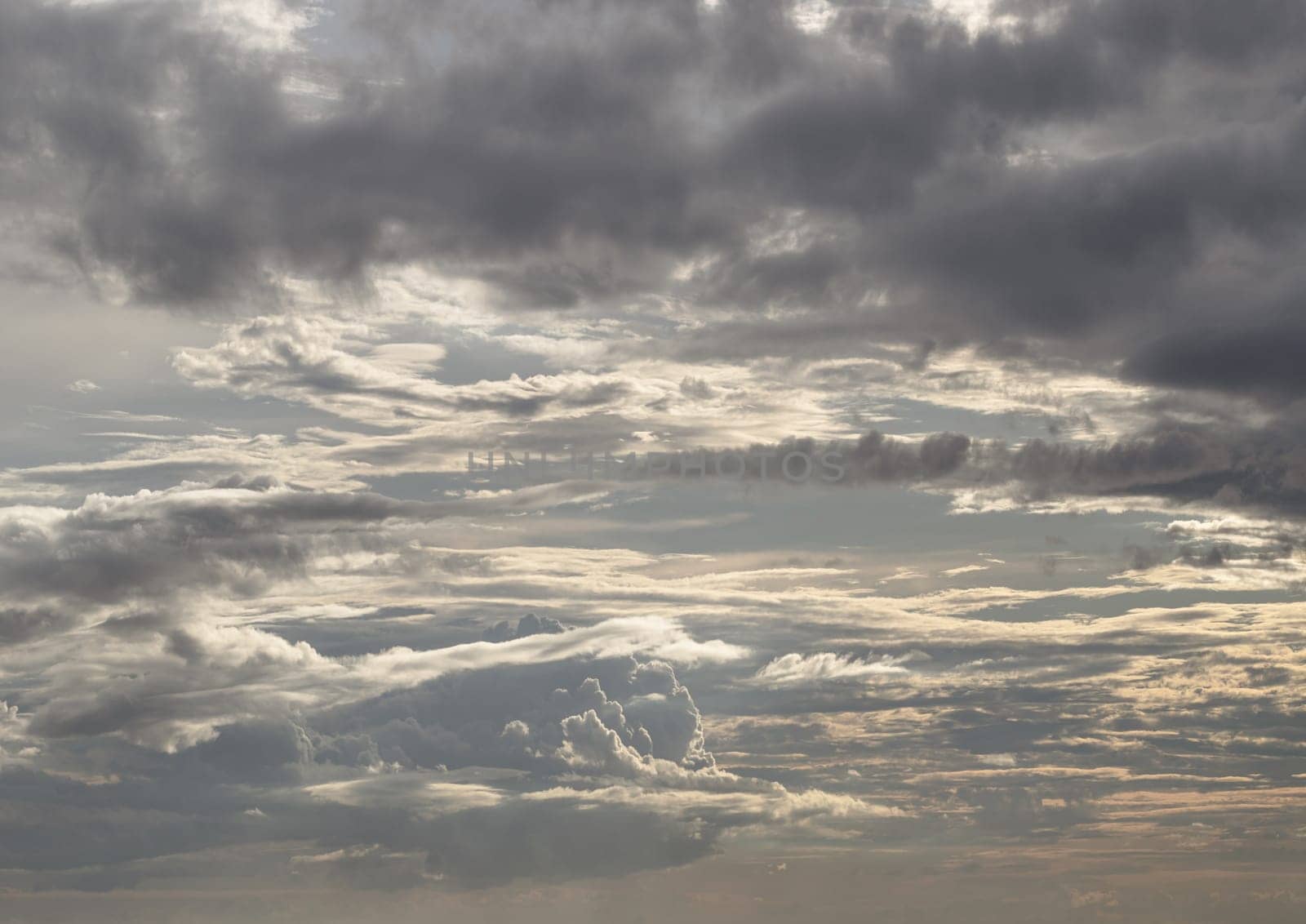 Colorful dramatic sky with cloud at sunset. Amazing clouds like a heaven for background wallpaper and texture, Concept idea of Imaginative clouds nature, Nature abstract composition, Space for text, Selective focus.