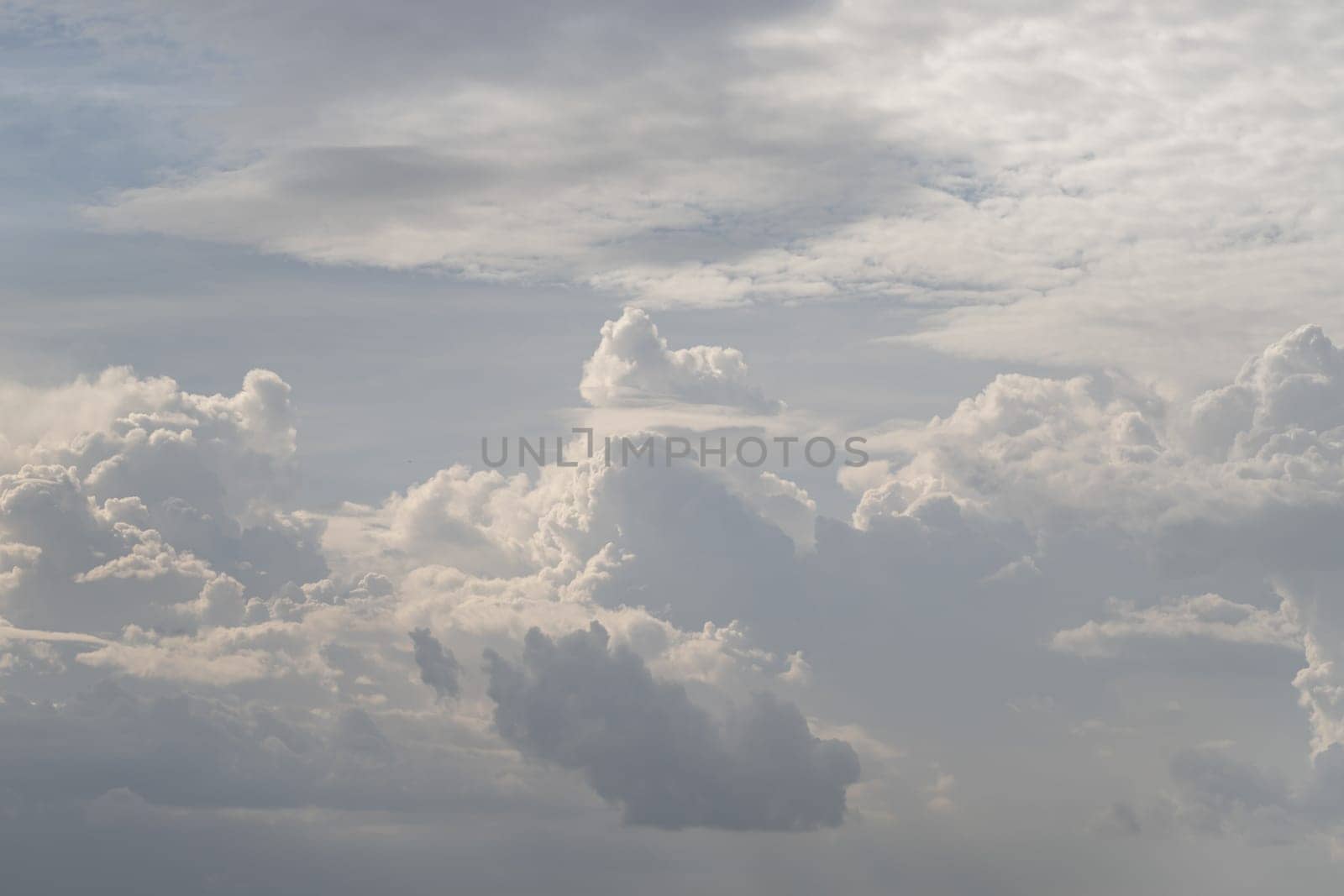 Beautiful sky with clouds background. The softness of the clouds and the brightness of the sky. Light blue background. Relaxing feeling and inspirational, Nature abstract composition, Space for text, Selective focus.