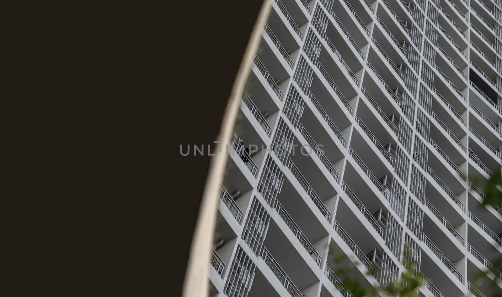 Bangkok, Thailand - 31 Aug, 2024 - Looking up geometric shapes on residential building in Bangkok. An awesome abstract pattern of repetitive details, Space for text, Selective focus.