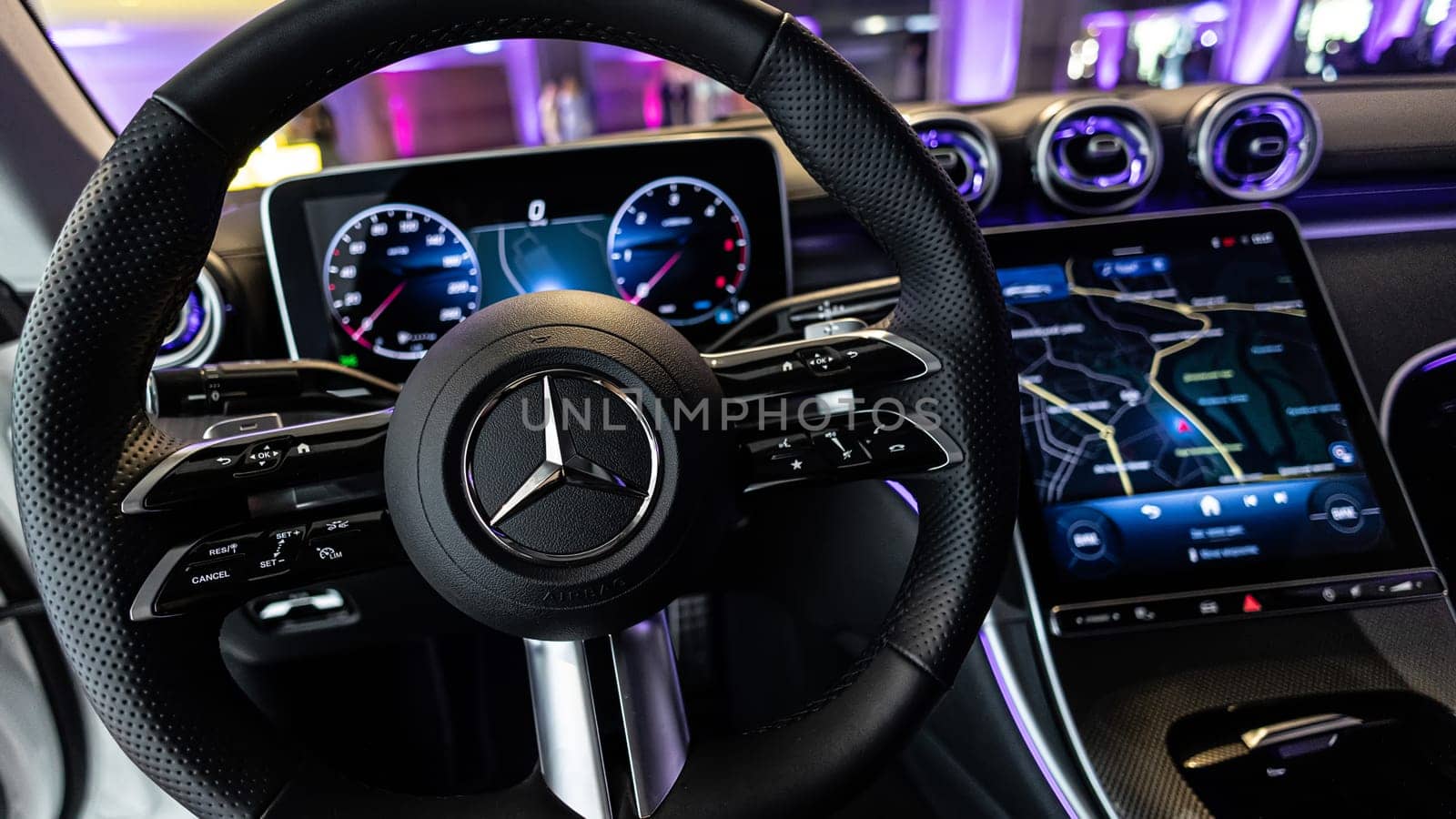 Kyiv, Ukraine - September 12: Mercedes-Benz luxury car interior showcasing the sleek design of the steering wheel, digital dashboard, and advanced navigation system