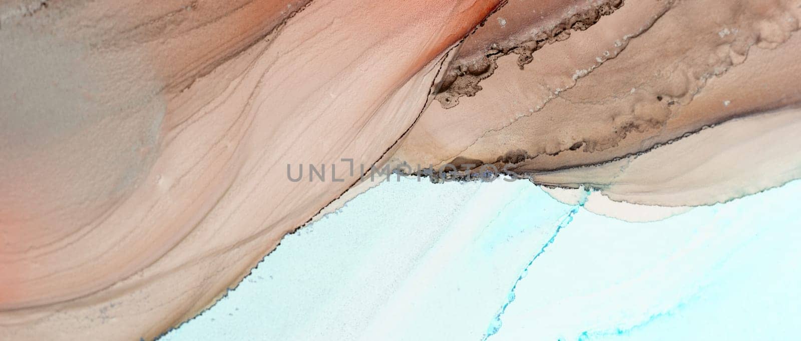 Vibrant abstract composition showcases flowing patterns in warm peach and cool turquoise, blending seamlessly in an artistic display of color and texture.