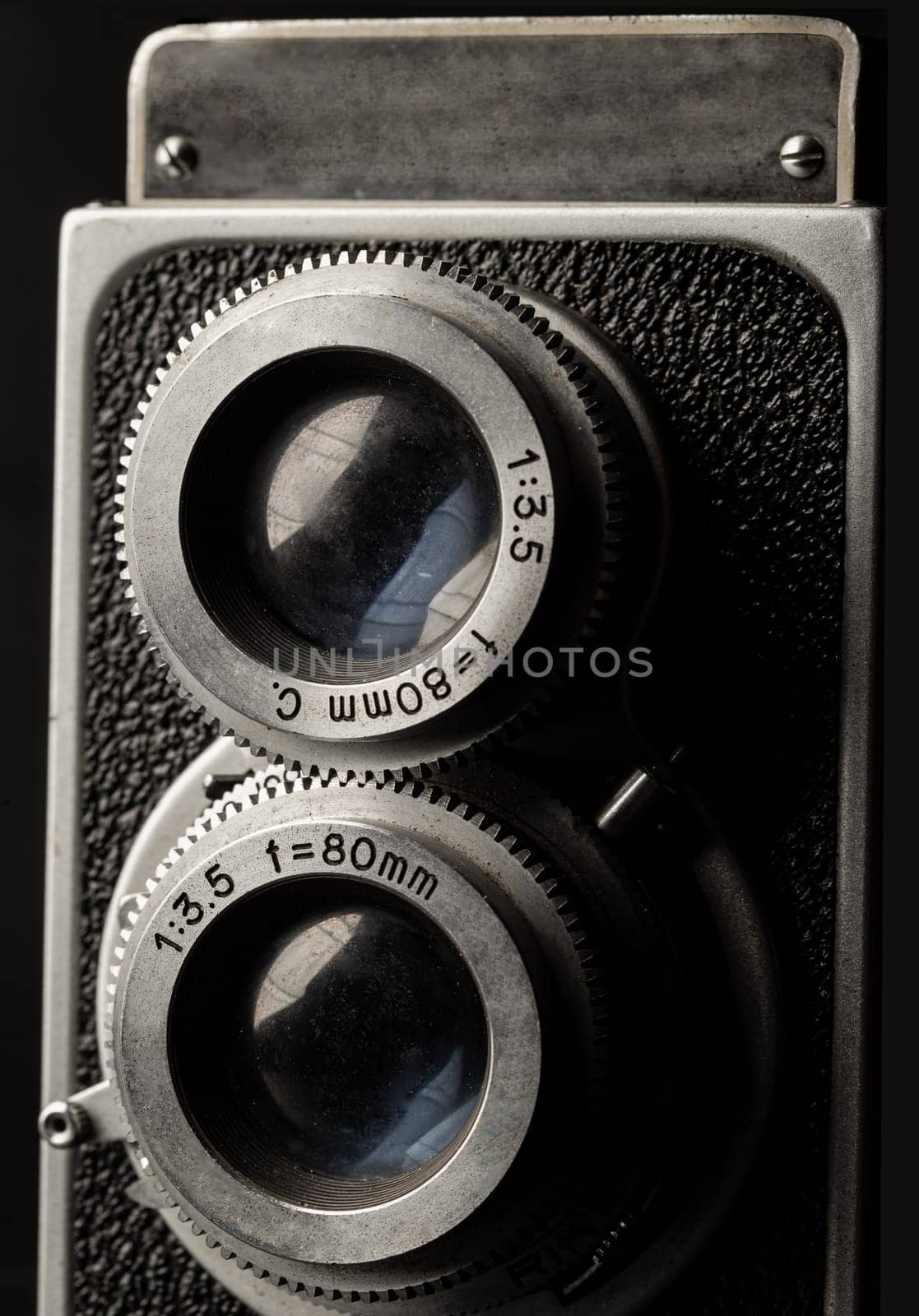 Bangkok, Thailand - 17 Sep, 2024 - Close-up of Old two lens medium format film camera or Vintage twin lens reflex photo camera. An idea of old camera and memory, Light and Shadow, Selective focus.