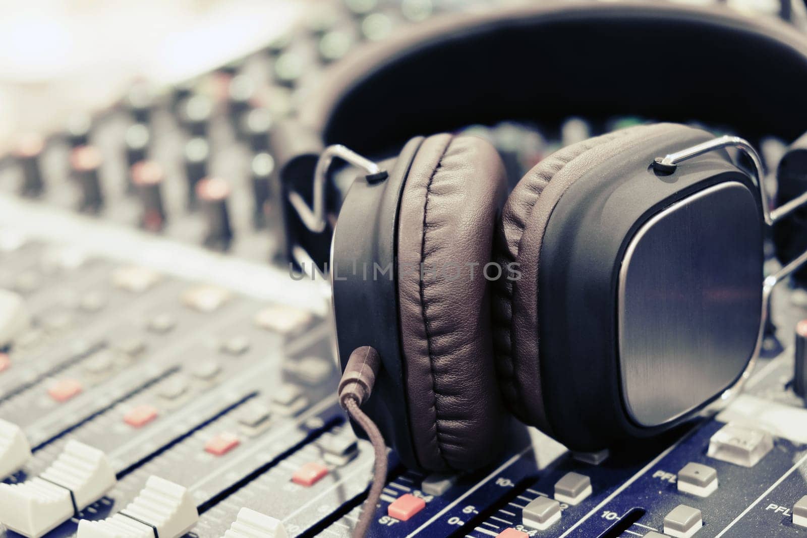 Headphones on sound mixer by ponsulak