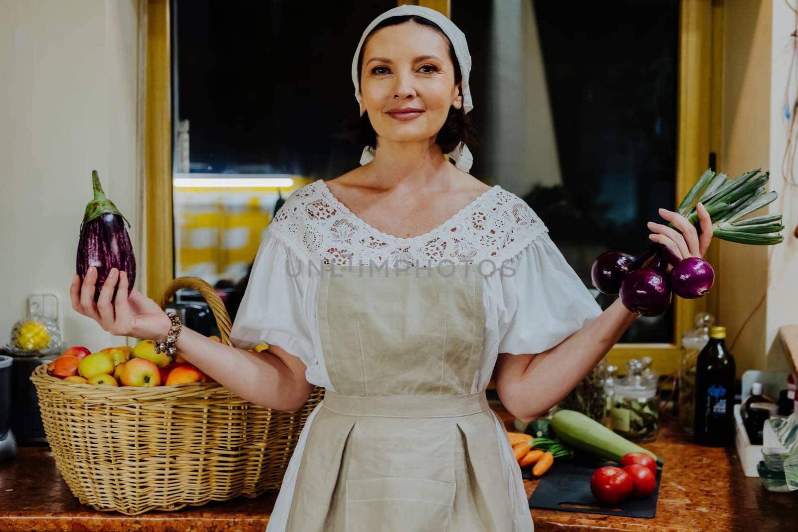 Woman dressed in a traditional white dress and apron.