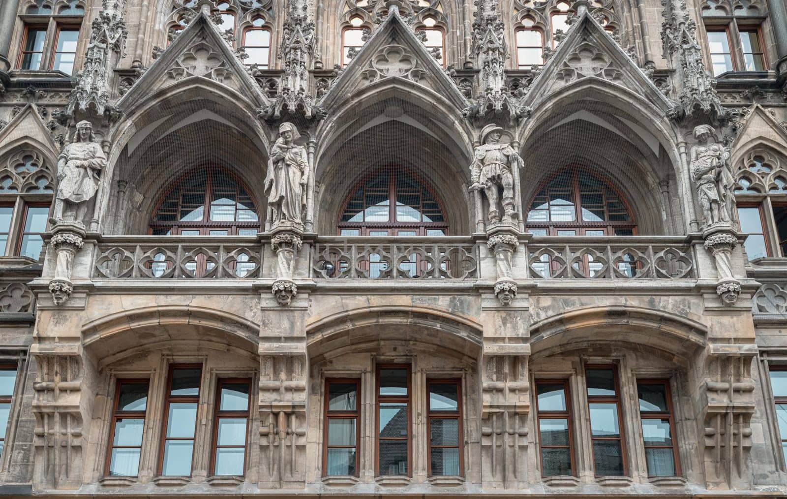 Munich, Germany - Dec 21, 2023 - Exterior architecture design details of famous New Town Hall (Neue Rathaus) on Marienplatz square in Munich. Gothic architectural style. Space for text, Selective focus.