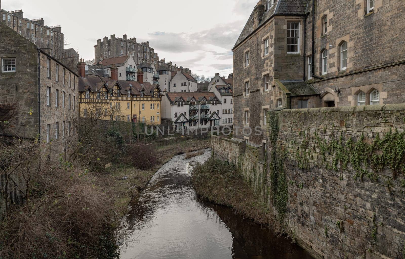 Edinburgh, Scotland - Jan 16, 2024 - Picturesque of Dean village with river and stream which sits along the banks of the Water of Leith. Copy space, Selective focus.