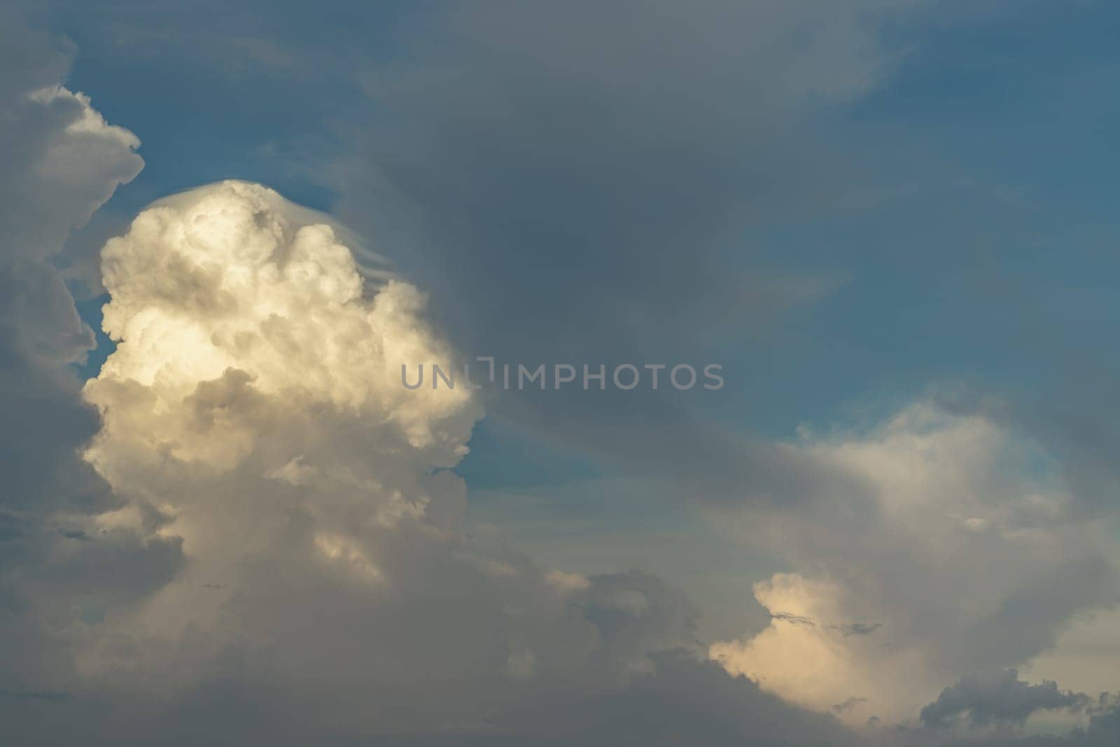 The sky is being covered with amazing clouds. Beautiful clouds like a heaven sky toward the light, Concept idea of Imaginative clouds nature, Nature abstract composition for background wallpaper and textures, Space for text, Selective focus.