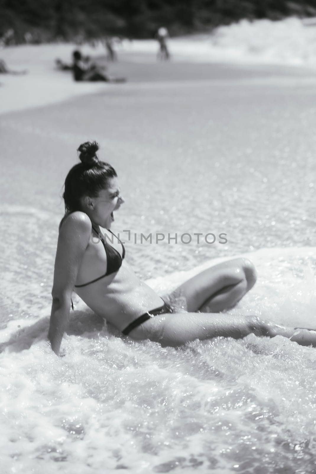 Enjoying a serene and peaceful moment by the sea, beautifully capturing the pure joy of a perfect beach day
