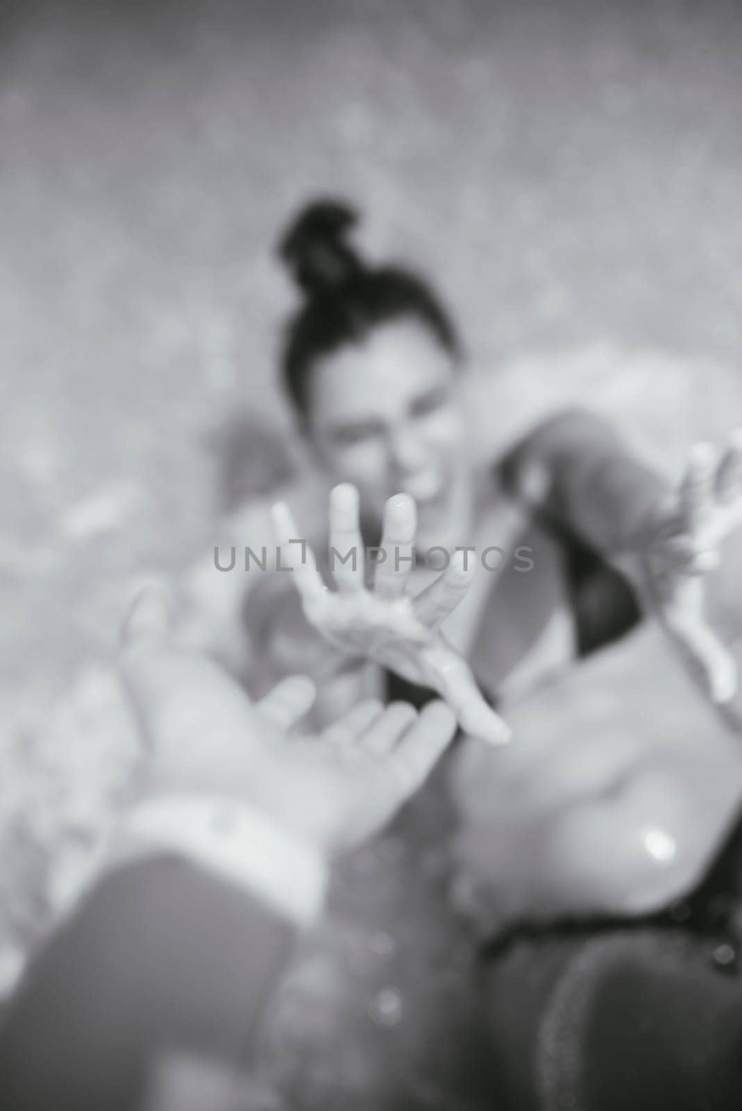 A powerful and moving image depicting a profound moment of emotional connection and reaching out for help