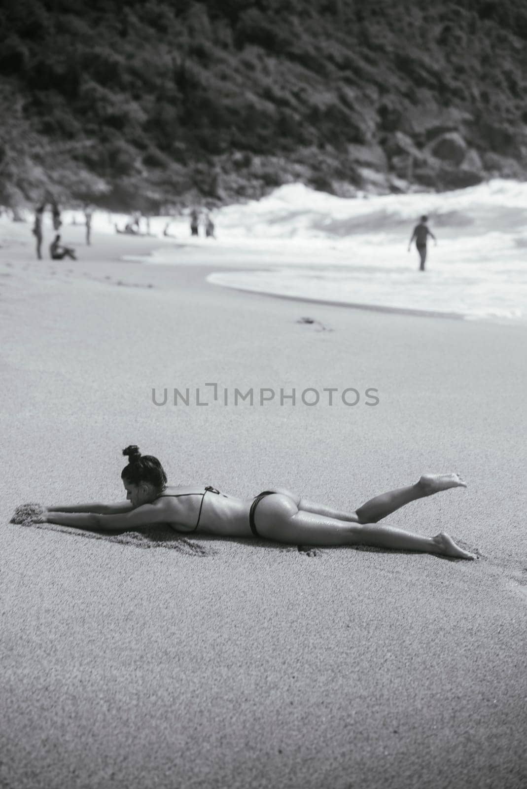A serene beach scene beautifully captured in striking black and white, emphasizing relaxation and deep tranquility