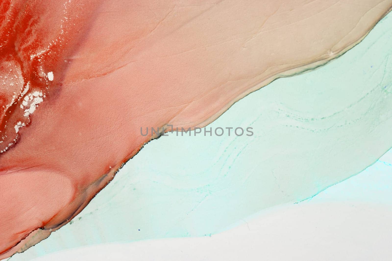Vibrant swirls of coral and teal come together in an abstract display, showcasing a delicate fusion of colors that evoke a serene and artistic ambiance.