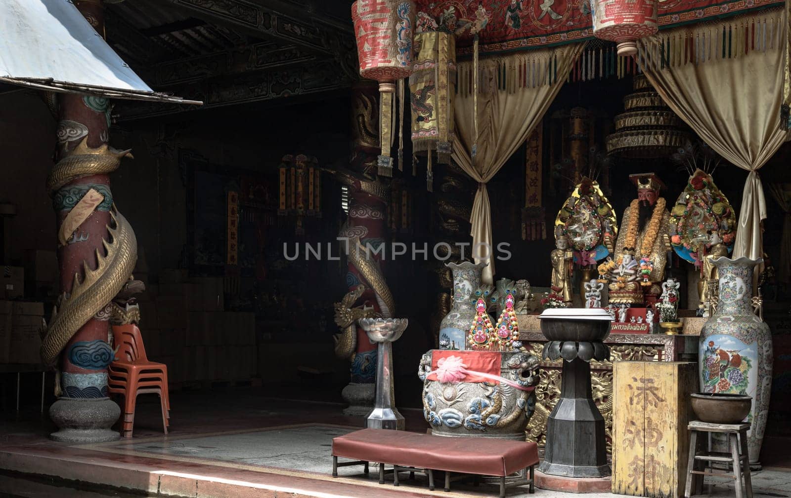 Bangkok, Thailand - Apr 29, 2022 - Chinese god statues on Chinese altar table at Phutthamonthon sathan or Sun wukong shrine. Space for text, Selective focus.