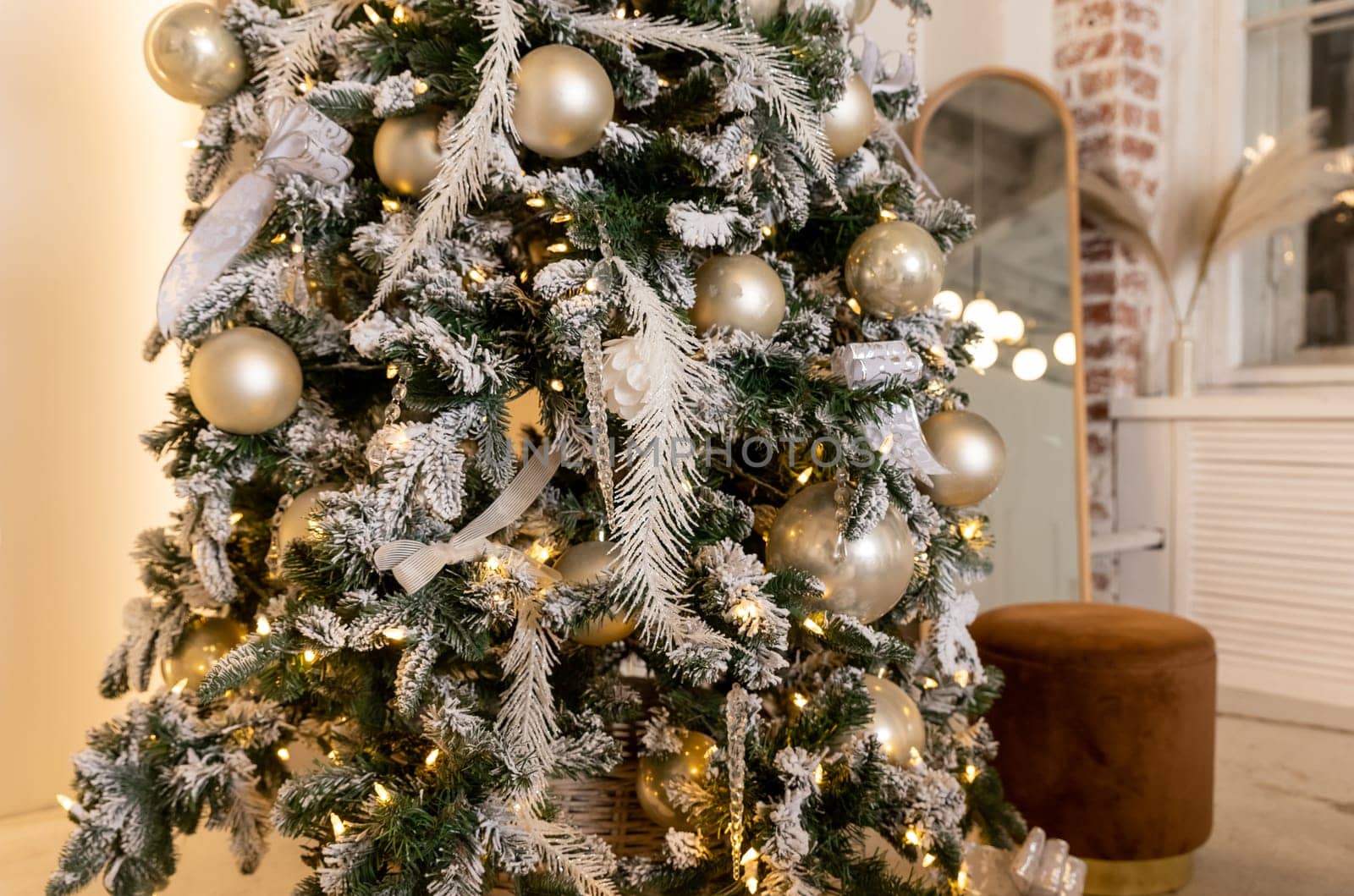 New Year. Christmas. Christmas tree. New Year's toys. Holiday. Interior. Decor. New Year's decor. Garlands Background.