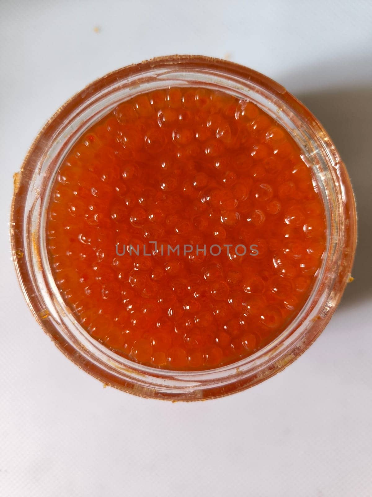 red caviar, healthy food, snack, white background texture. High quality photo