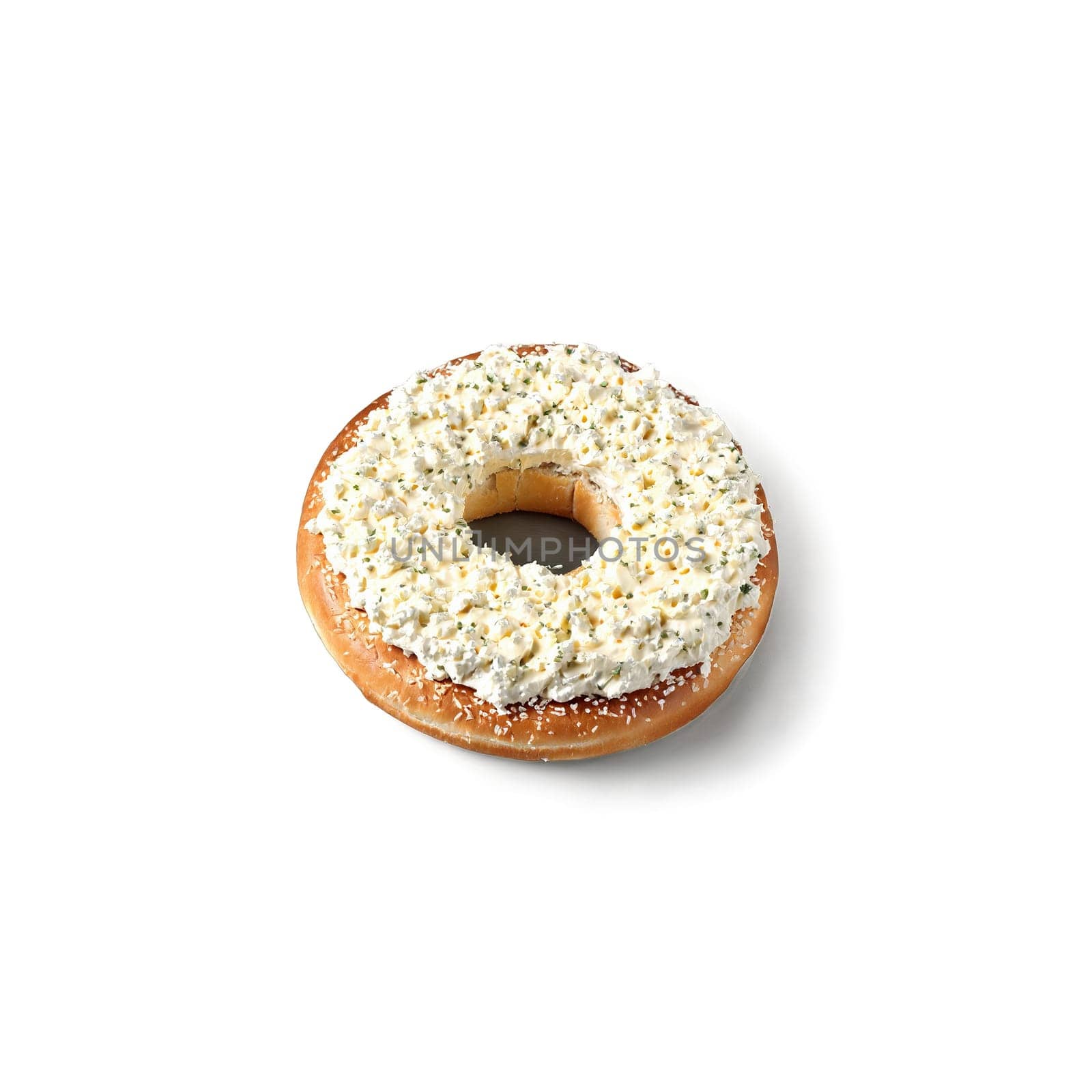 Cream cheese spread on bagel with knife and curls of cheese in motion Food and. Food isolated on transparent background.