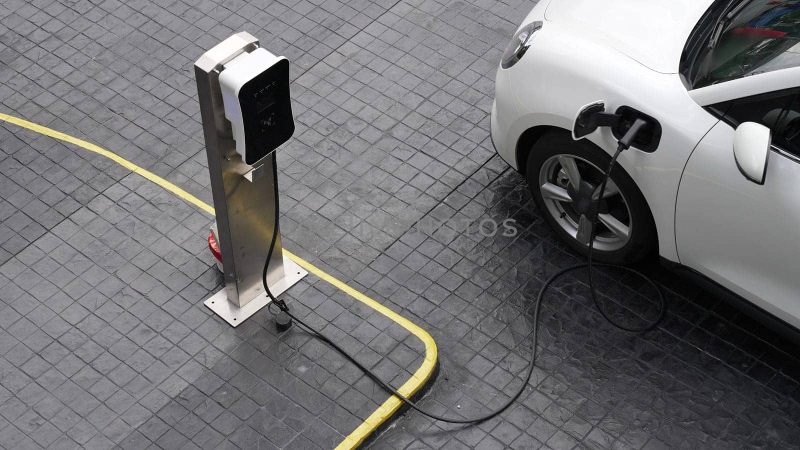 Progressive innovation urban electric on-street charging station with EV car. by biancoblue