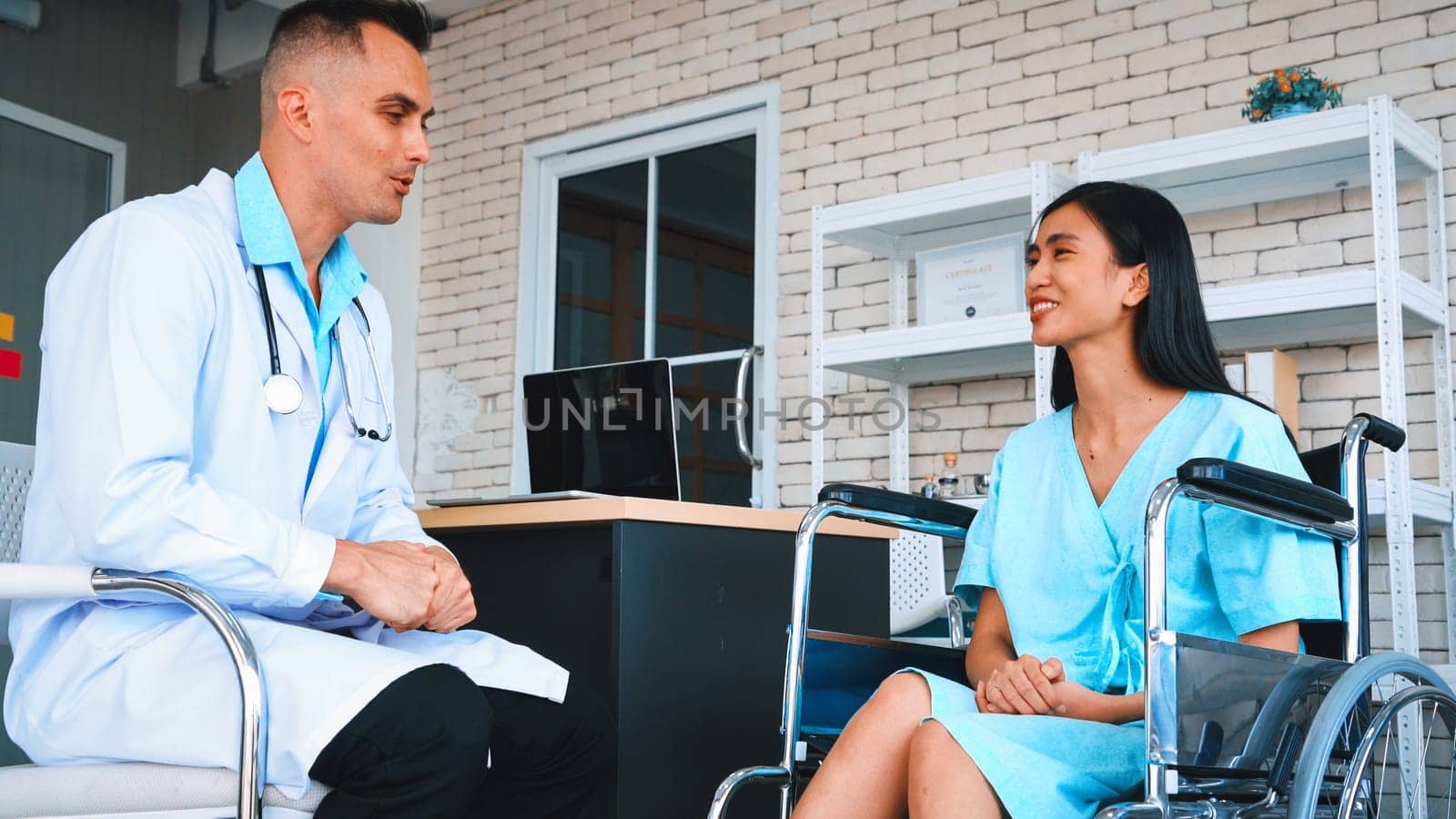 Doctor in professional uniform examining patient at hospital or medical clinic. Health care , medical and doctor staff service concept. Jivy