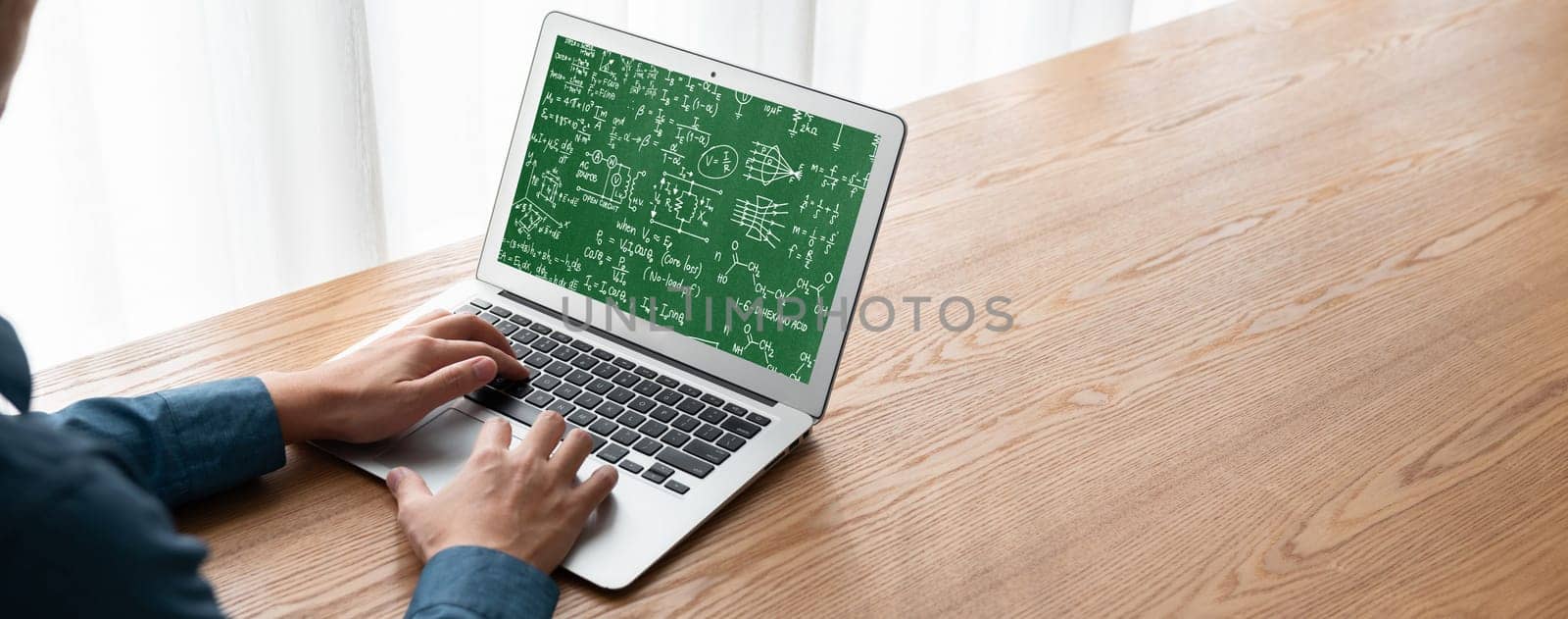 Mathematic equations and modish formula on computer screen showing concept of science and education