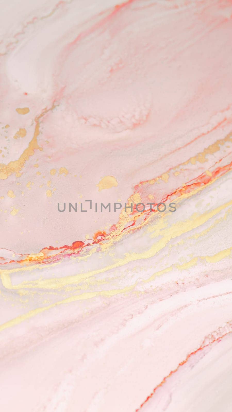 Delicate swirls of pink and gold merge seamlessly, creating an elegant and calming abstract design that evokes tranquility and warmth.