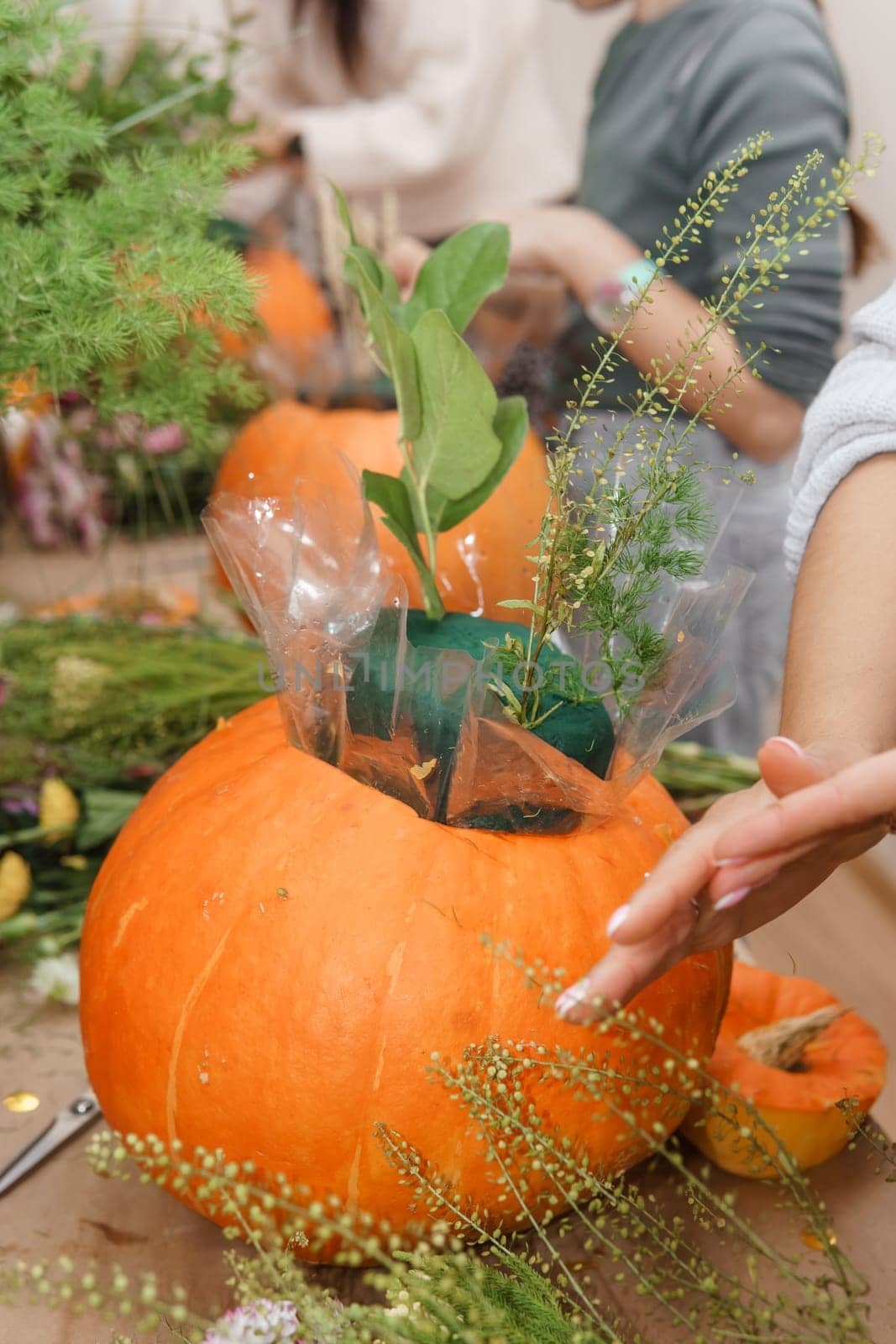 Creating a floral composition in a pumpkin. Making decor with your own hands
