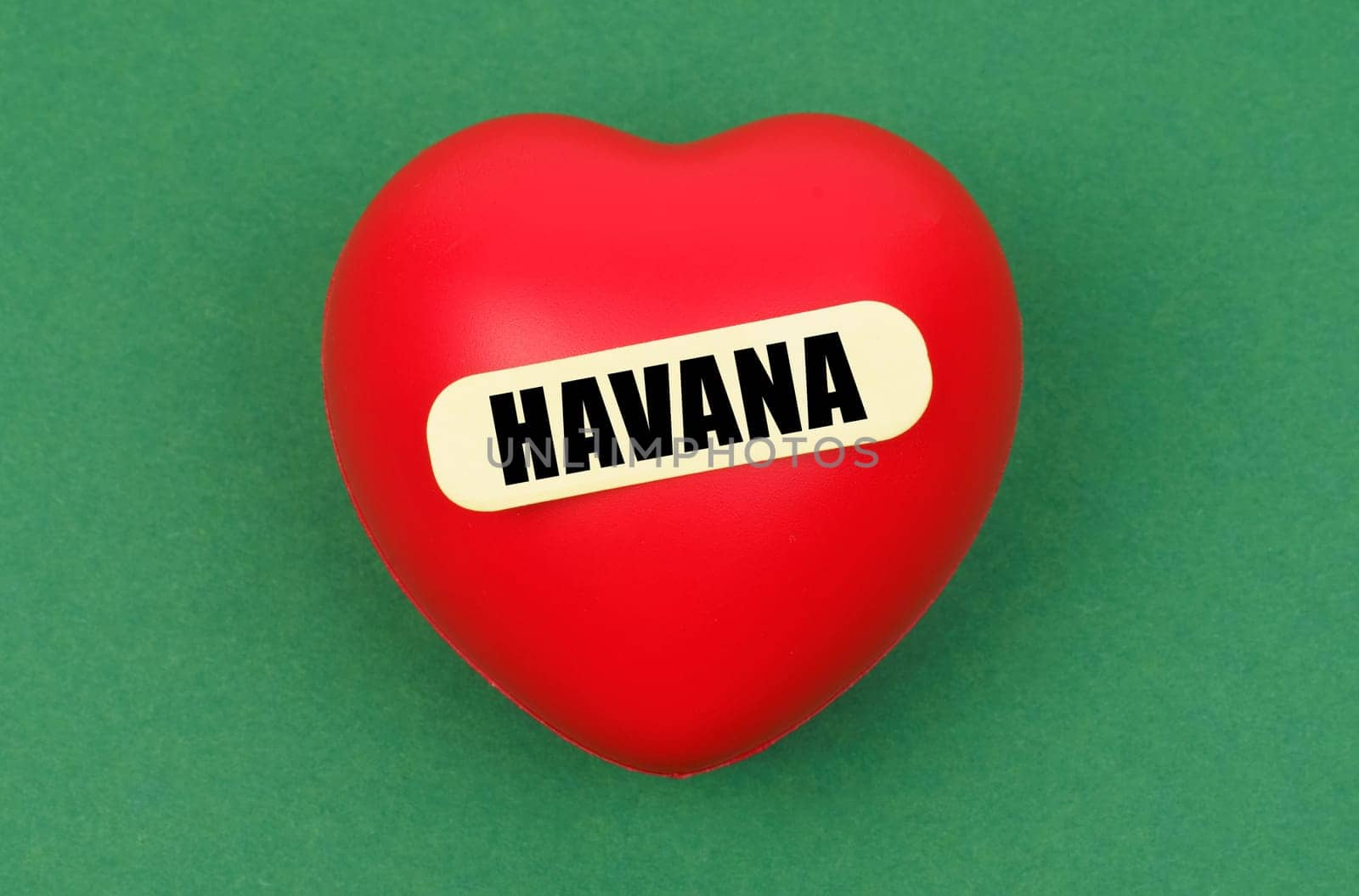 A bright red heart with Havana inscribed showcases the capital's charm, symbolizing affection and connection to the city.