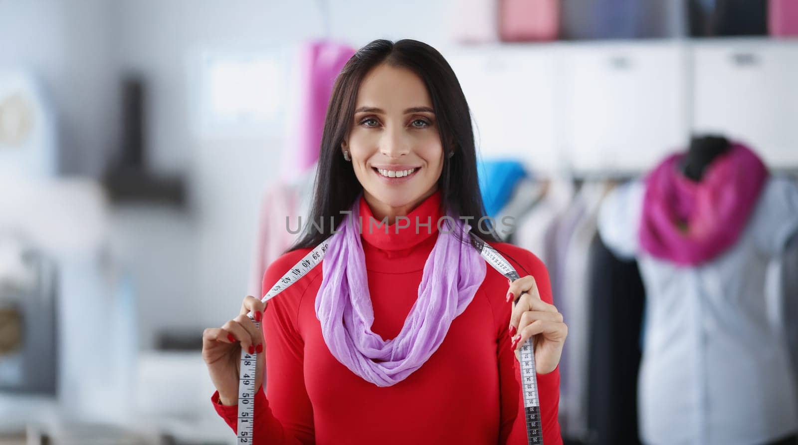 Portrait of talented atelier worker creating glamour collection for fashion industry. Dressmaker with fashion vision and good taste. Atelier, art concept