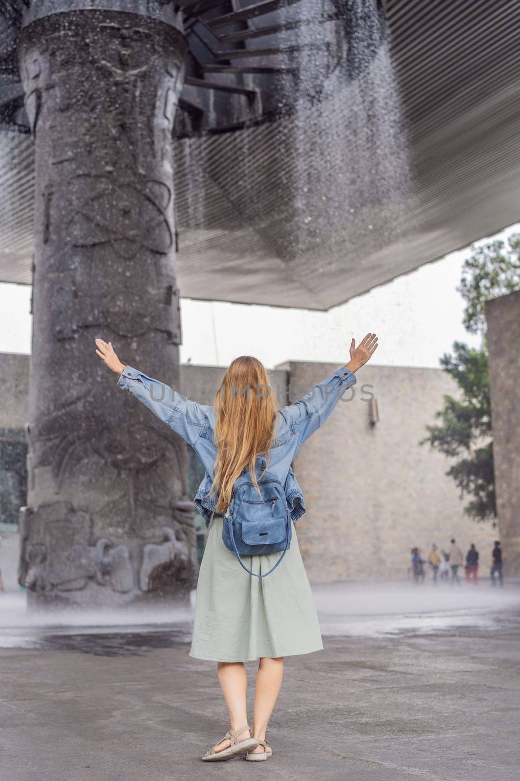 Female tourist exploring the National Museum of Anthropology in Mexico City. Cultural heritage and historical exploration concept.