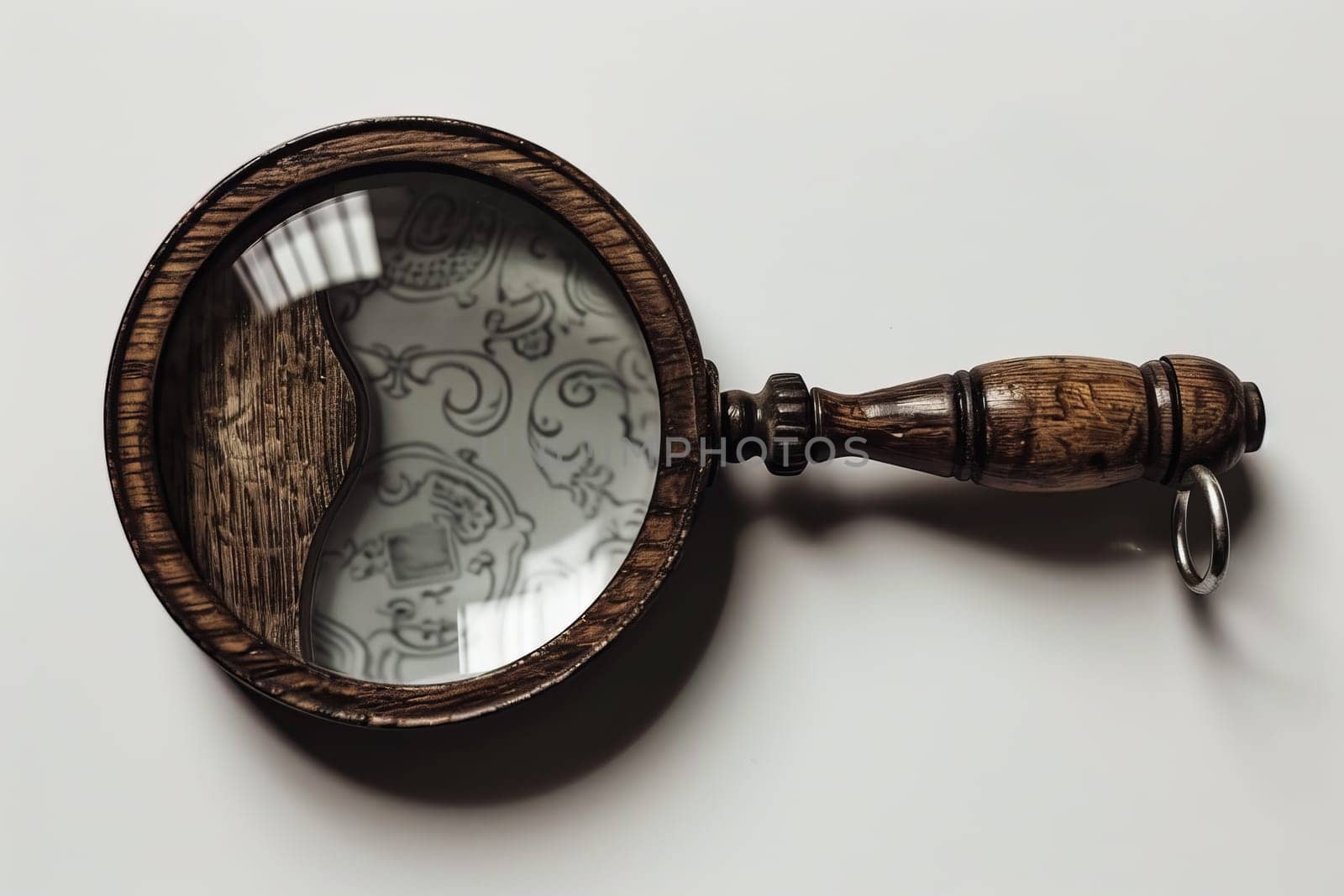 Close up of a magnifying glass isolated on a clean white background for clarity and focus