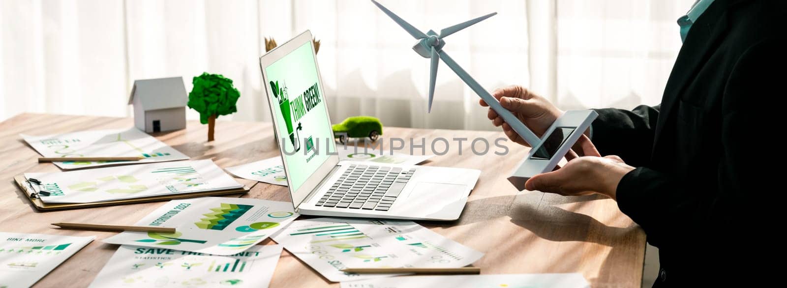 Businessman in green corporate company planning eco-friendly. Trailblazing by biancoblue