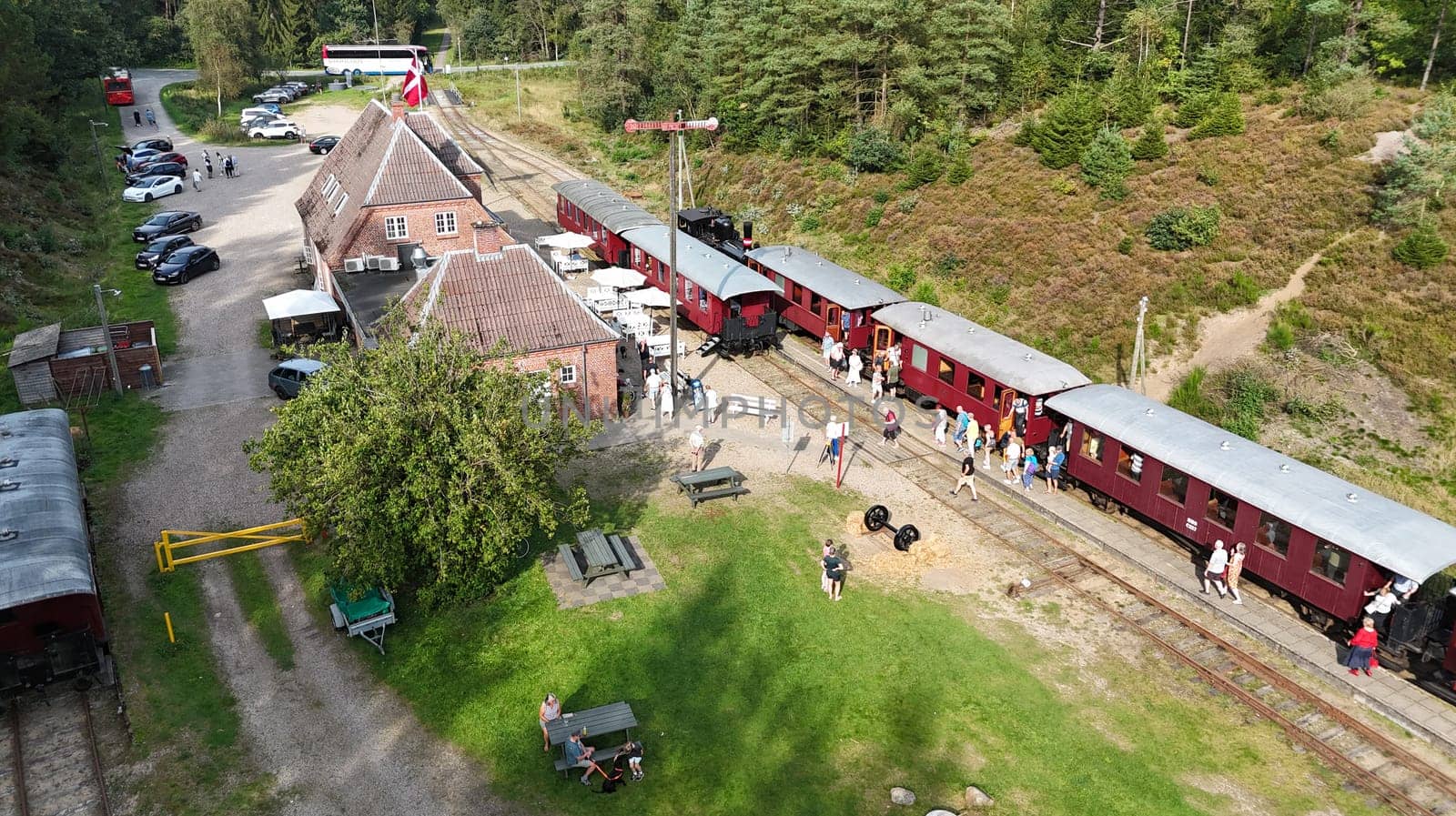 Vrads,denmark,08-09-2024:people at the train station waiting for the steam train from Vrads to Bryrup in denmark