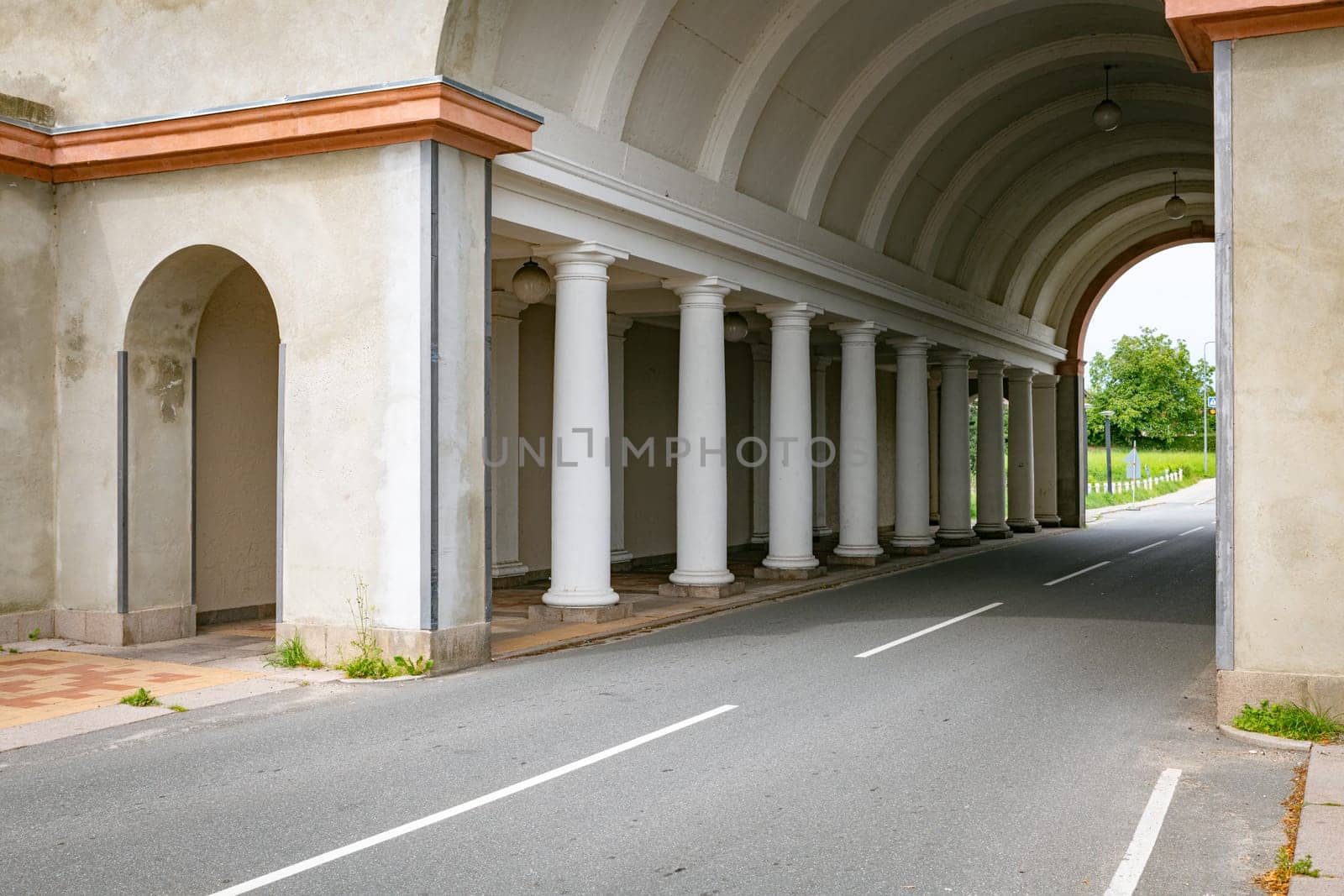 archway entrance to the city of fredericia in denmark with beautiful old pillars