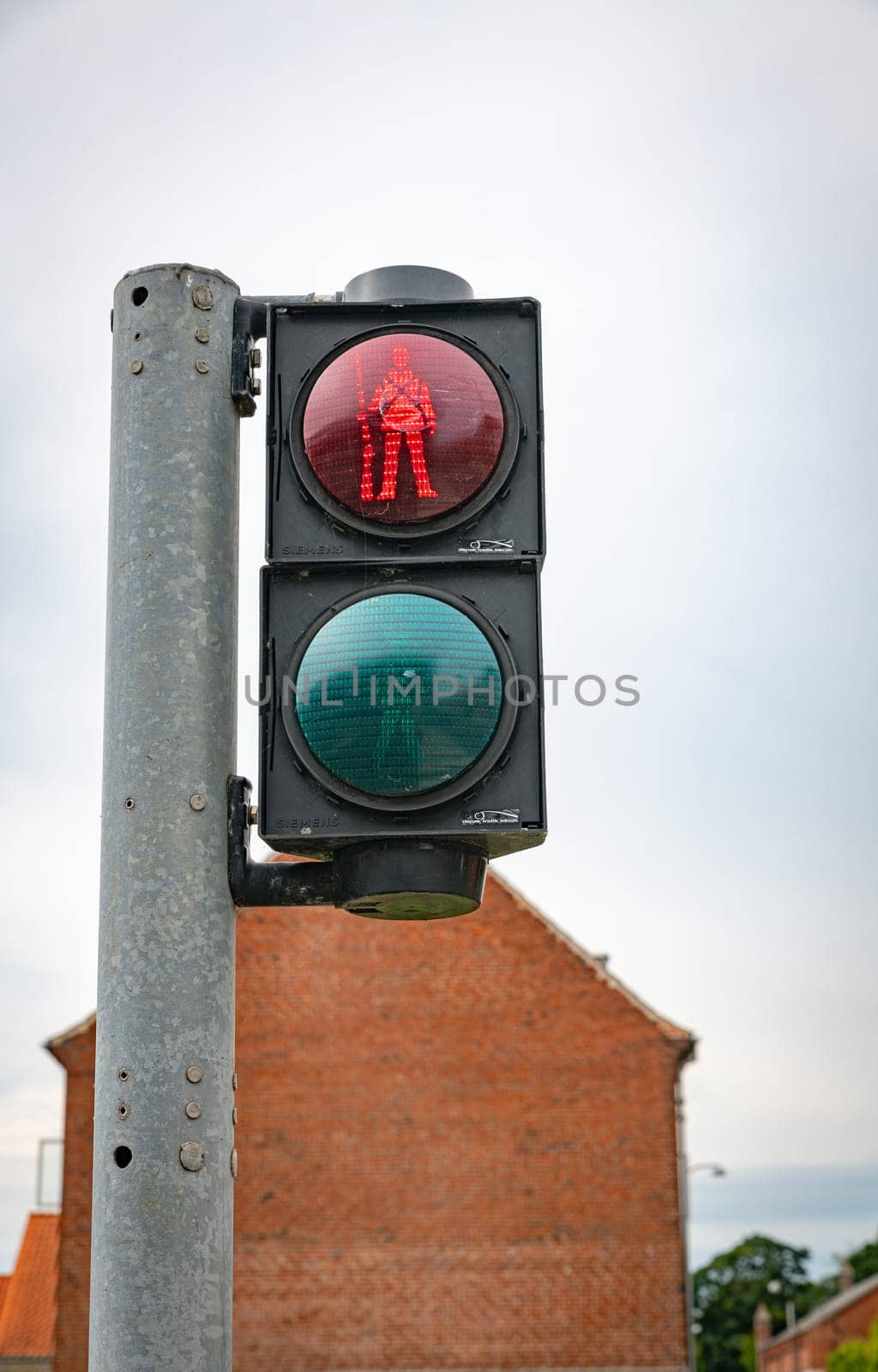 Local pedestrian traffic light with ancient soldier in Fredericia, Denmark