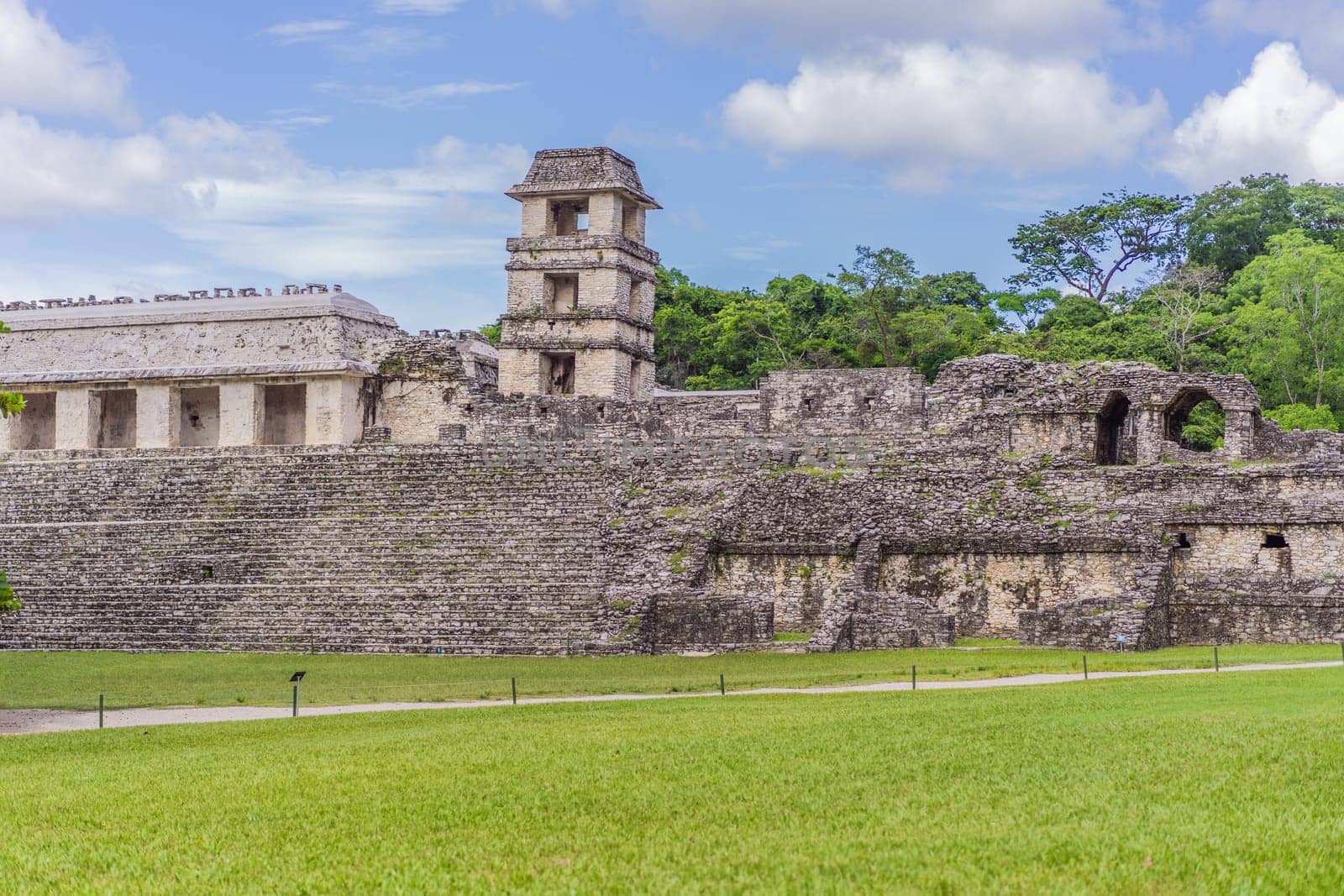 The ancient pyramids of Palenque in Mexico, surrounded by lush jungle. Iconic archaeological site showcasing Mayan culture and history. Travel, history, and adventure concept.