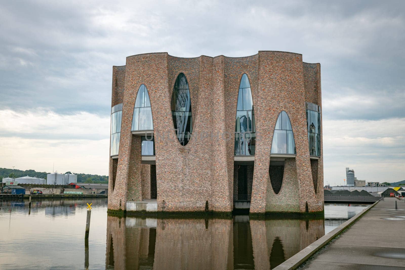 The iconic Fjordenhus between two houses in the harbour basin of Vejle, Denmark,