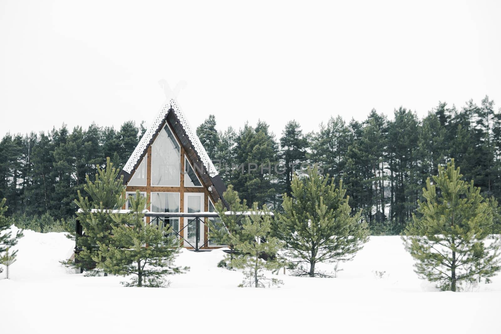 A country house in nature in winter. Rest in an ecologically clean place in winter. Glamping in nature