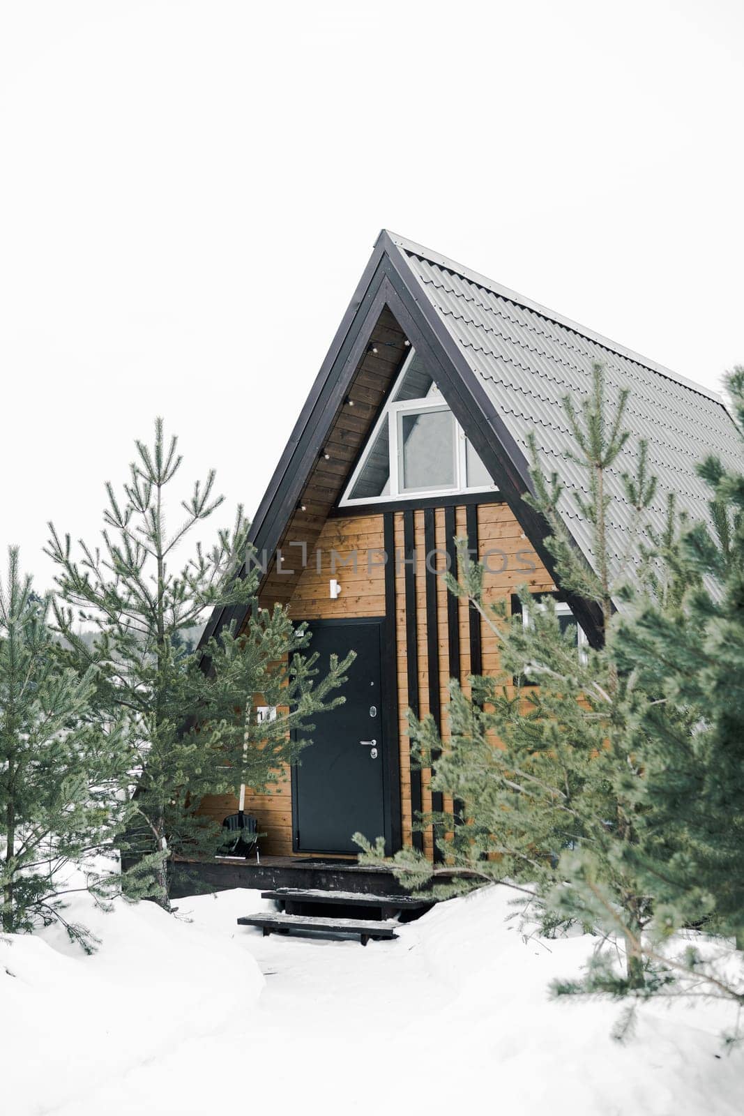 A country house in nature in winter. Rest in an ecologically clean place in winter. Glamping in nature