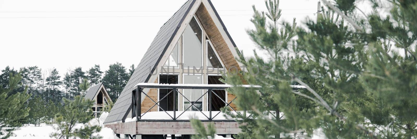 A country house in nature in winter. Rest in an ecologically clean place in winter. Glamping in nature
